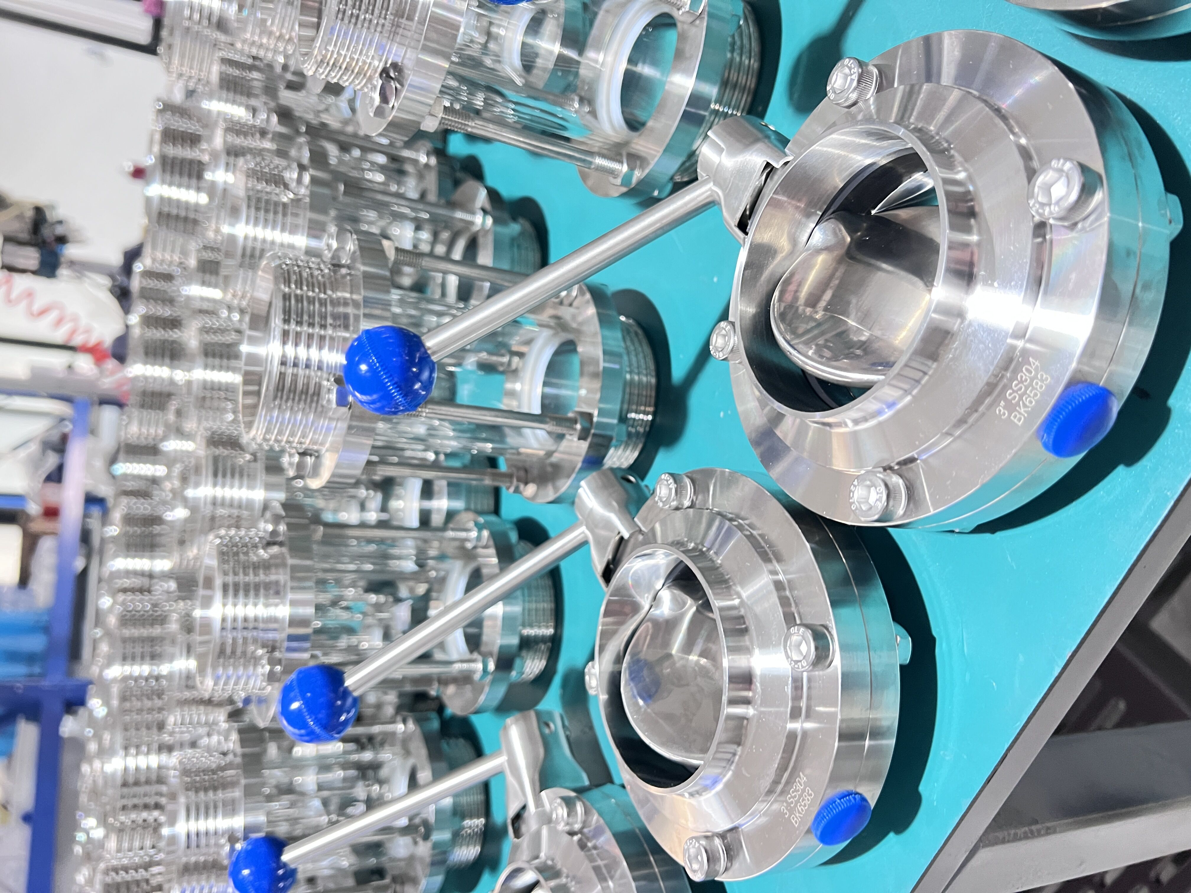 What is the role of sanitary butterfly valves in the transport and storage of dairy products?？